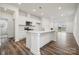 Modern kitchen featuring white cabinets, an island, and stainless steel appliances at 730 Olde England Dr, Lincolnton, NC 28092