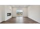 Living room with fireplace and sliding glass door to backyard at 730 Olde England Dr, Lincolnton, NC 28092