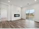 Living room with fireplace and sliding glass doors at 730 Olde England Dr, Lincolnton, NC 28092