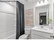 Clean bathroom featuring a shower/tub combo and vanity at 8104 Haidas Ave # 036, Charlotte, NC 28214