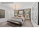Elegant main bedroom with a king-size bed and stylish decor at 8104 Haidas Ave # 036, Charlotte, NC 28214