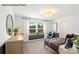 Bright bedroom with large windows, plush carpeting, and ample closet space at 8104 Haidas Ave # 036, Charlotte, NC 28214