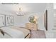 Bright bedroom with a king-size bed and walk-in closet at 8104 Haidas Ave # 036, Charlotte, NC 28214
