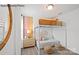 Well-designed bedroom with a bunk bed, sofa, and artistic wall accents at 8104 Haidas Ave # 036, Charlotte, NC 28214