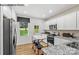 Modern kitchen with stainless steel appliances and kitchen island at 8104 Haidas Ave # 036, Charlotte, NC 28214