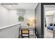 Upstairs study area with a desk and chair, overlooking the home at 8104 Haidas Ave # 036, Charlotte, NC 28214