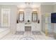 Elegant bathroom featuring dual vanities, decorative mirrors, a shower, and a tub under a window at 720 Miller Chapel Rd, Salisbury, NC 28147