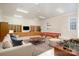 Spacious game room featuring a pool table, foosball table, sofa, and built-in shelves with display cabinets at 720 Miller Chapel Rd, Salisbury, NC 28147