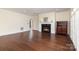 Living room boasting a fireplace, hardwood floors, and a view to the hall at 720 Miller Chapel Rd, Salisbury, NC 28147