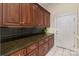 Featuring extensive cabinets and counters, this butler's pantry is ready for your next dinner party at 720 Miller Chapel Rd, Salisbury, NC 28147