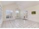 Bright sunroom with tile flooring, large windows, and french doors leading to the exterior at 720 Miller Chapel Rd, Salisbury, NC 28147