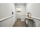 Spacious entry with wood-look floors and decorative console table at 7026 Quail Hill Rd, Charlotte, NC 28210