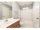 Clean bathroom with single vanity and shower/tub combo at 9318 Lake Spring Ave, Charlotte, NC 28216