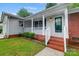 House exterior with brick steps and covered porch at 1308 Rama Rd, Charlotte, NC 28211