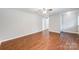 Bright living room featuring hardwood floors and neutral walls at 1308 Rama Rd, Charlotte, NC 28211