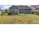 The home's backyard features a fenced-in yard and a flat grassy area at 2009 Atherton Dr, Indian Trail, NC 28079