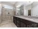 Spacious bathroom with a glass shower and dual sink granite vanity at 2009 Atherton Dr, Indian Trail, NC 28079