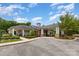 Beautiful clubhouse featuring covered entrance, white columns, and manicured landscaping for community gatherings at 2009 Atherton Dr, Indian Trail, NC 28079