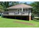 Exterior of home featuring a deck, grill, and view of the backyard at 436 E Oakwood Ave, Albemarle, NC 28001