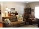 Living room with comfortable seating, a piano, and antique furniture for a classic touch at 436 E Oakwood Ave, Albemarle, NC 28001