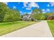 Charming home featuring a manicured lawn, inviting front porch, and classic columns providing curb appeal at 112 Berea Baptist Church Rd, Stanfield, NC 28163