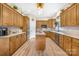 Spacious kitchen with granite countertops, a center island, stainless steel appliances, and ample cabinet space at 112 Berea Baptist Church Rd, Stanfield, NC 28163