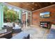 Outdoor porch with brick wall and a view of the pool at 112 Berea Baptist Church Rd, Stanfield, NC 28163