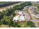 Community pool and clubhouse with surrounding homes at 1180 Weir Ct, Fort Mill, SC 29708