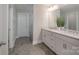 Double vanity bathroom with a walk-in shower and modern finishes at 1180 Weir Ct, Fort Mill, SC 29708