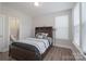 Cozy bedroom with a queen-size bed and ensuite bathroom at 1180 Weir Ct, Fort Mill, SC 29708