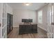 Home office with built-in bookcases and hardwood floors at 1180 Weir Ct, Fort Mill, SC 29708