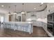 Bright kitchen featuring white cabinets and granite countertops at 1180 Weir Ct, Fort Mill, SC 29708