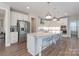 Modern kitchen with stainless steel appliances and large island at 1180 Weir Ct, Fort Mill, SC 29708