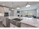 Modern kitchen with farmhouse sink and open concept to living area at 1180 Weir Ct, Fort Mill, SC 29708