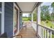 Wooden deck porch with a view of the backyard and trees at 1180 Weir Ct, Fort Mill, SC 29708