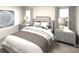 Serene bedroom with neutral-colored bedding and gray nightstands at 210 Alden Ct, Shelby, NC 28152