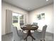 Formal dining room with hardwood floors and a round table for four at 210 Alden Ct, Shelby, NC 28152