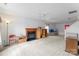 Bright and airy living room featuring a fireplace and neutral carpet at 4242 Quinn Dr, Charlotte, NC 28269