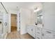 Elegant bathroom featuring a glass-enclosed shower, double vanity, and ample storage space with a walk-in closet at 2008 Embassy Ct # 45, Charlotte, NC 28213