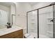Modern bathroom featuring a glass-enclosed shower, sleek vanity, and neutral color palette at 2008 Embassy Ct # 45, Charlotte, NC 28213