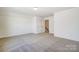 Spacious carpeted bedroom featuring two closets and natural light at 2008 Embassy Ct # 45, Charlotte, NC 28213