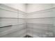 Walk-in pantry with wire shelving for ample storage space at 2008 Embassy Ct # 45, Charlotte, NC 28213