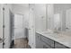 Stylish bathroom with double vanity, gray cabinets, white countertop, and modern fixtures at 3253 Mcharney Dr # 27, Harrisburg, NC 28075