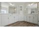 Elegant bathroom with dual sinks, modern cabinetry, and sleek fixtures, offering both style and functionality at 3253 Mcharney Dr # 27, Harrisburg, NC 28075