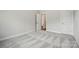 An airy bedroom featuring plush carpeting and neutral walls, perfect for relaxation and comfort at 3253 Mcharney Dr # 27, Harrisburg, NC 28075