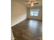 Bright bedroom with ample natural light, hardwood floors, and a modern ceiling fan at 3933 Townes Blvd, Terrell, NC 28682