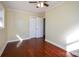 Bedroom showcasing wood floors, closet, neutral paint, and natural light at 611 Greenbriar Ave, Rock Hill, SC 29730