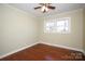 Bedroom showcasing hardwood floors, window, and a ceiling fan at 611 Greenbriar Ave, Rock Hill, SC 29730