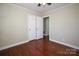 Bedroom features beautiful hardwood floors and closet storage at 611 Greenbriar Ave, Rock Hill, SC 29730