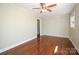 Bedroom featuring hardwood floors, ceiling fan, and freshly painted walls at 611 Greenbriar Ave, Rock Hill, SC 29730